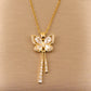 Collier Papillon Éclat Doré – Élégance et Raffinement